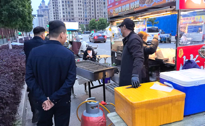 遂平县城管局开展露天烧烤专项整治宣传周活动